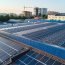 Aerial View Of Solar Power Plant With Blue Photovoltaic Panels M